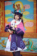 Portrait of a beautiful young woman game Cosplay with Chinese dress