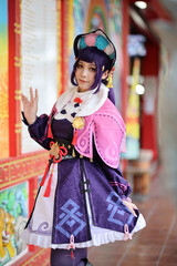 Naklejka premium Portrait of a beautiful young woman game Cosplay with Chinese dress