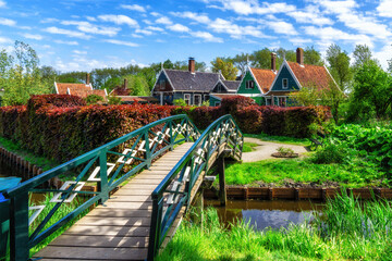 Picturesque view of traditional Houses by the Canal in the Historic Village of Zaanse Schans, The Netherlands