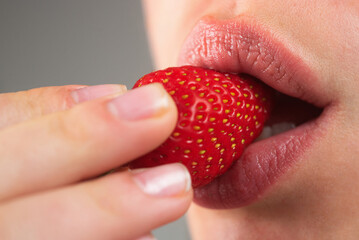 Erotic woman secret and sex symbols concept. Orgasm. Talk sex. Strawberry lubricant. Sexy Woman Eating Strawberry. Strawberry in Sensual Lips. Desire. Sexy red Lips with Strawberries. Sexy Strawberry. - obrazy, fototapety, plakaty
