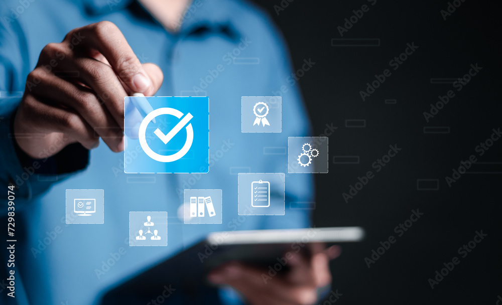 Poster standardization and certification concept. businessman touch virtual approval icon for quality manag