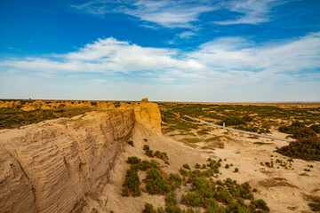 A view of an ancient watchtower built by sand and stones on a dessert landscape in ancient Suoyang City,Guazhou County,Jiuquan,Gansu Province,China.