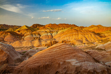 Fototapeta na wymiar Rainbow Mountains, Zhangye Danxia Landform Geological Park, Gansu, China, is geological wonder of the world. The mountain is known for its colorful rock formations like paint palette.