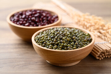 Green and red mung bean in wooden bowl, Food ingredients