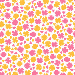 Seamless pattern with pink and yellow flowers and pink and yellow hearts.