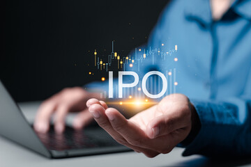 IPO, Initial public offering concept. Businessman use laptop with virtual IPO word with stock graph for boosting the growth by IPO process. - obrazy, fototapety, plakaty