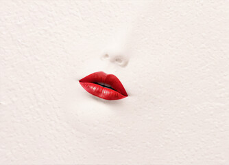 imprint of a kiss with red lipstick on a white sheet of paper, red lips