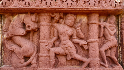 Carvings of Yali and Hindu deities Panel on the Group of Jain Temples, Peenjana, Baran, Rajasthan, India.