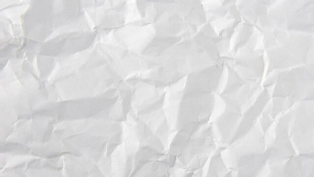 Stop motion animated crumpled white paper texture background.