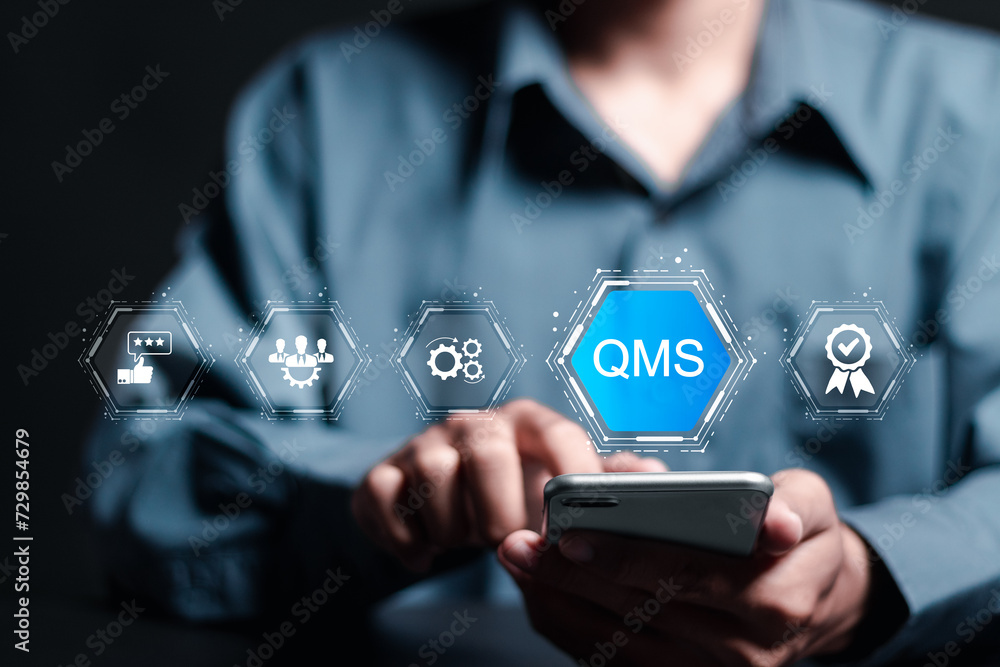 Poster qms, quality management system concept. businessman use smartphone with virtual qms icon for managem