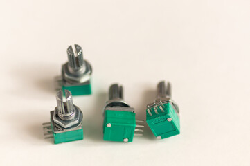 Variable resistor isolated on white background. Electronic parts concept. potentiometer.