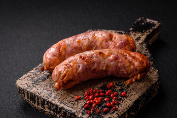 Delicious grilled chicken or pork sausages with salt and spices