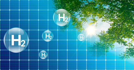 Renewable energy and environmental concept.H2 hydrogen atom icon on solar panels' surfaces. Produce...