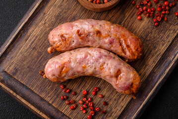 Delicious grilled chicken or pork sausages with salt and spices