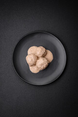 Delicious meatballs from minced chicken or turkey with sour cream sauce
