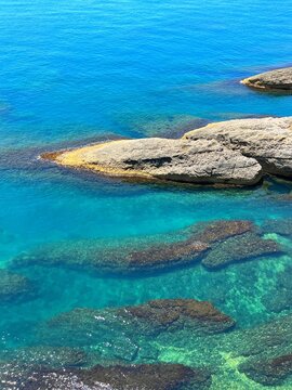 Blue sea and scenic coastal rocks.