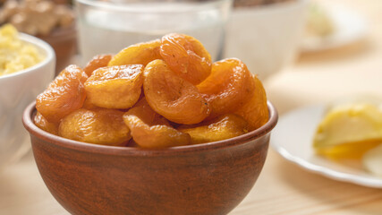 Dried apricots in a clay cup, the concept of healthy and healthy food