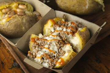 Homemade Loaded Baked Potatoes with Cheddar, Mince Meat and Sweet and Sour Sauce