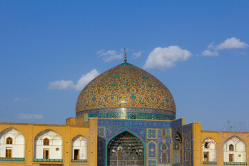 Fototapeta na wymiar impeccably beautiful dome of a mosque in Naghshe Jahan square in Esfahan, Iran with details of tile work and plaster work.