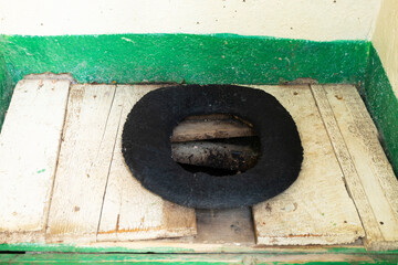 The toilet is rural. Public or private toilet outside the home, on the farm, or along the road. Old...