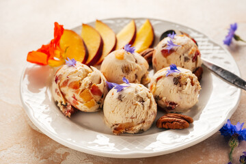 Homemade peach ice cream in a plate