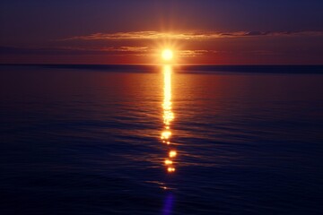 midnight sun reflecting off calm arctic ocean