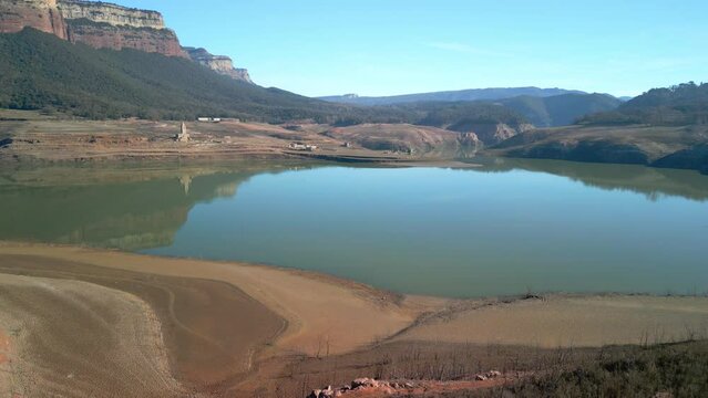 Sau swamp dike in Catalonia, Spain, Drone flight over desert land, dry lake in Spain intense drought in 2024