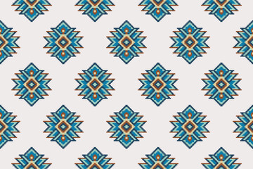 Beautiful ethnic seamless pattern in tribal.Ikat textile texture in native American,Mexican,African style.Aztec geometric fabric folk art.Boho ornament.Design for carpet, wallpaper,clothing,rug,woven.