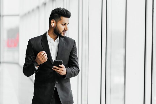 Handsome Bearded Indian Man Businessman Worker Black Suit He Speaks Phone Through Wireless Headphones