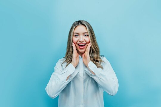 Portrait Attractive Young Girl Who Is Surprised With Smile Blue