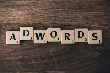 AdWords word letter dice on wooden background, social media concept