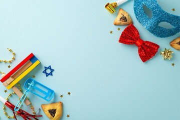 Purim theme top view photo: Triangle cookies, Star of David motifs, and celebration accessories...