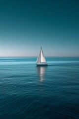 Obraz premium A serene, minimalist seascape with a solitary sailboat on calm, azure waters