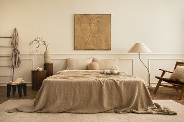 Cozy bedroom interior with mock up poster frame, big bed, beige bedding, plaid, lamp, wooden...
