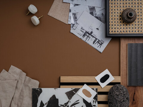 Creative flat lay composition of interior designer moodboard with textile and paint samples, panels and tiles. Color palette. Copy space. Template.	