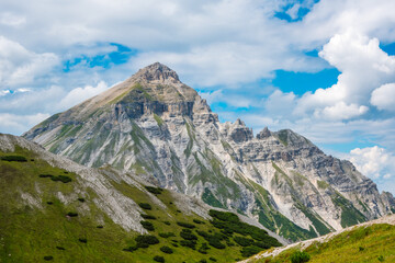 Beautiful alpine peak on sunny summer day. Serles peak 2,718 m, Stubai Alps, Tyrol, Austria. - obrazy, fototapety, plakaty