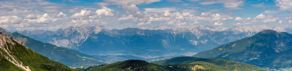 Panoramic summer view of the Tux Alps and the Wipptal valley, Tyrol, Austria.