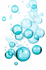 Bunch of bubbles floating in the air on white background.