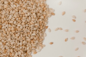 sesame seeds. Pile of white sesame seeds as background, top view