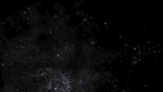 Snow dust particles fly in slow motion in the air lingering slowly. Dust Particles Background Bokeh Lights Background on Black Background 4k Footage Snow Particles Background.