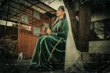 Muslim woman in old retro tradition dress on outdoor