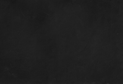 Old black paper background. Grunge wallpaper