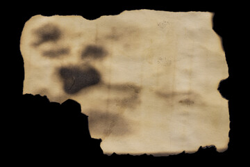 A Piece Of Old Burnt Paper On A Black Background