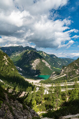 Fototapeta premium Pragser Wildsee lake with hills above in the Dolomites