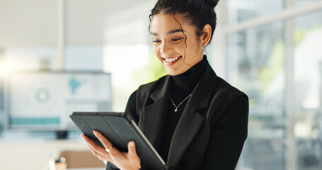 Happy businesswoman in office with tablet, email or social media for business feedback, schedule or...