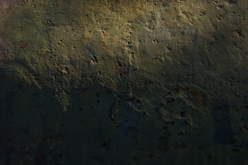 Military metal background. Old military relief texture of the tank green color