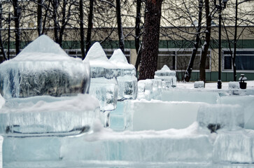 Figures and buildings made of ice in a park