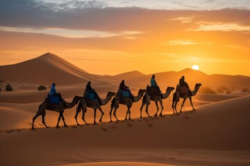 Fototapeta na wymiar tourists on camels crossing desert dunes at sunrise