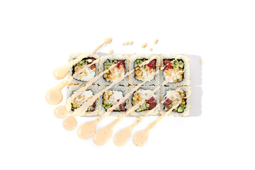 Vegetable Roll with Fried Onions and Nut Sauce on a Clean White Surface