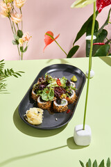 Vegetarian Sushi Roll with Sesame, Mixed Salad, and Fresh Vegetables. Perfect for health-conscious dining and plant-based cuisine.